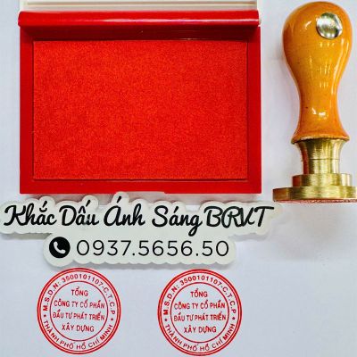 Khắc dấu công ty bằng đồng chấm mực